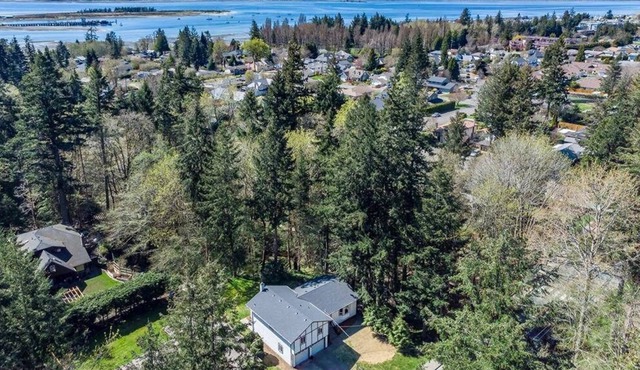 Stunning Creekside Comox Character Home
