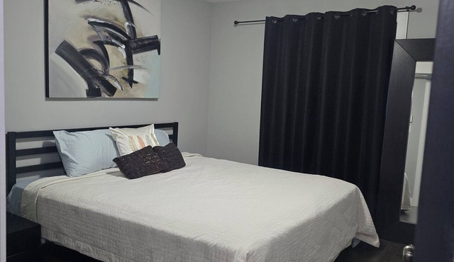 Stylish 3BR Apartment w/Private Balcony & City River View