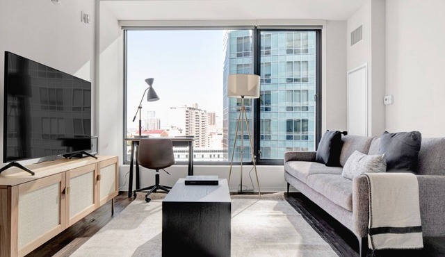 Stylish Downtown 1BR w/Luxury Amenities and Rooftop Views by Blueground in Boston