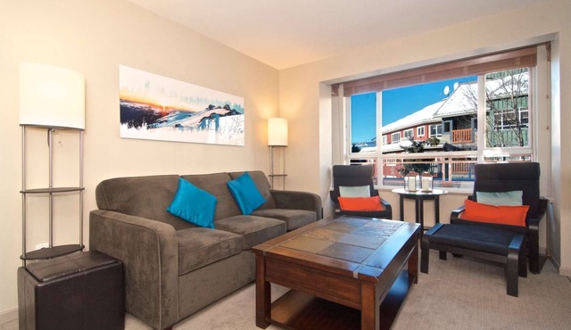 Superb Village location, comfortably renovated and one FREE parking stall