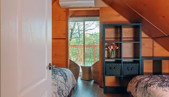 The Woodpecker Retreat | Spacious 3-Bedroom Riverfront Cottage in PEC