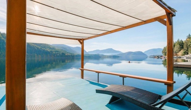 Tranquilize at Spectacular Sproat Lakefront Waterfront Authentic Timber Log Home