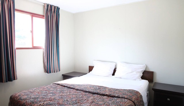 Wake up to waves at "Just Beachy"