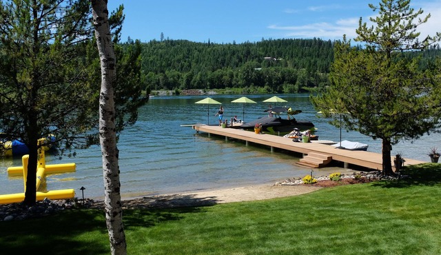 Waterfront Log Home | Private Dock | Expansive Beautiful Yard and Gardens in Sagle