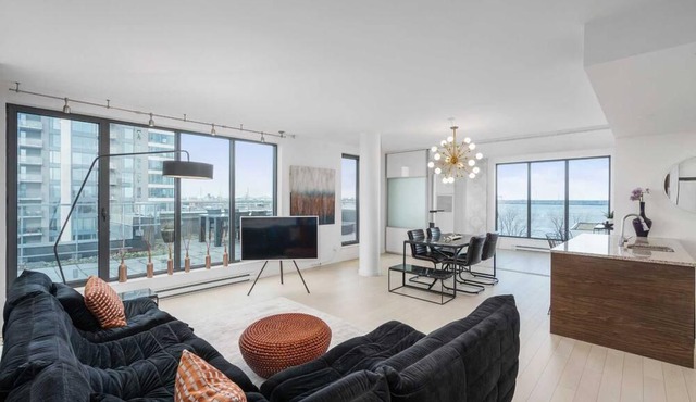 Waterfront penthouse with 1000 square feet patio
