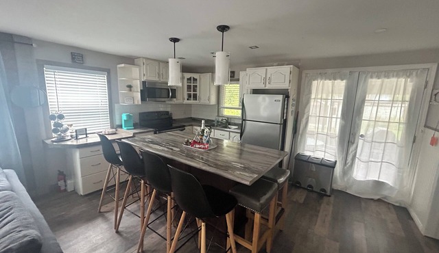 Welcome to our modern cozy three bedroom cottage located in Pointe-du-Chene