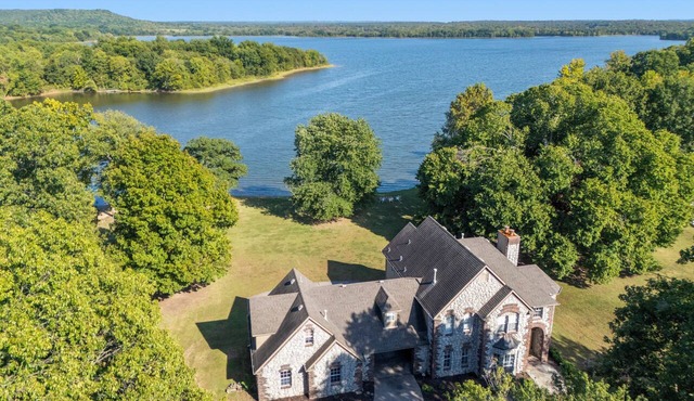 Your Splendid Sanctuary awaits in this magical escape to the lake! in Sand Springs