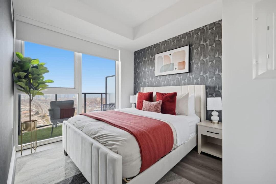 The Queensway Apartment | Sleek 2BR Toronto Condo Patio & Free Parking