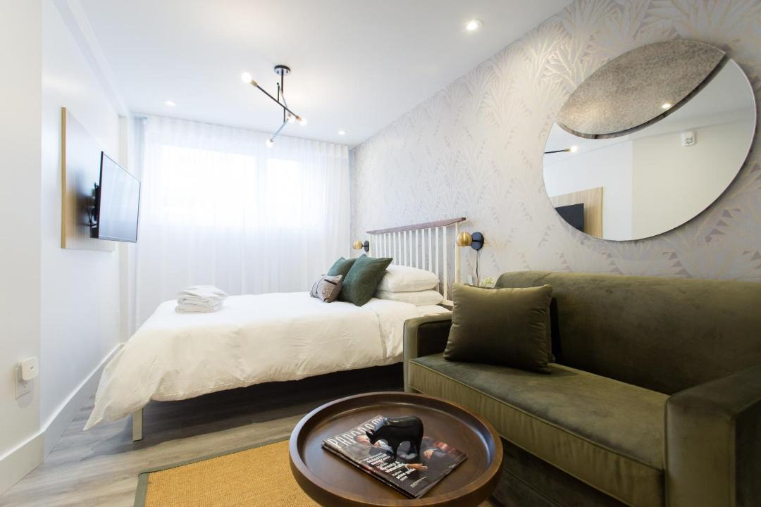Little Italy Apartment | Serene and Styled Little Italy Studio full bath by Den Stays