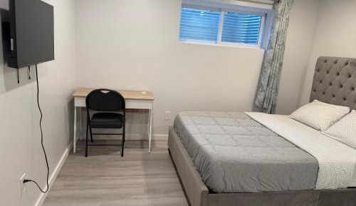 Queen Room with Shared Bathroom