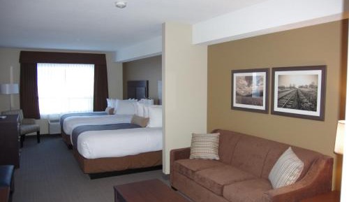 Queen Suite with Two Queen Beds and Sofa Bed