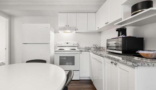 Queen Suite with Two Queen Beds, Sofa Bed, Separate Living Area and Full Kitchen - Non-Smoking