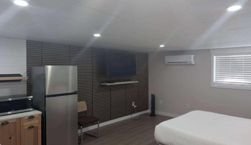 Queen Room with Roll-In Shower and Kitchenette - Mobility Accessible/Non-Smoking