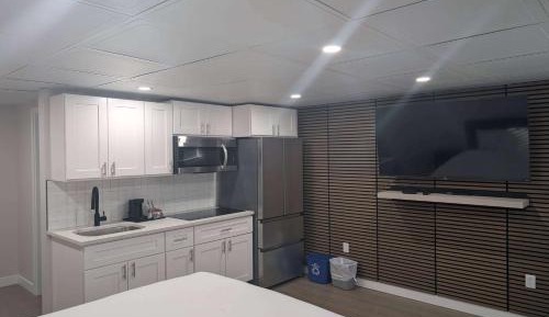Suite with One Queen Bed and Kitchenette - Roll-In Shower - Non-Smoking