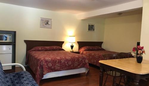 Family Room with Two Queen Beds and Sofa Bed
