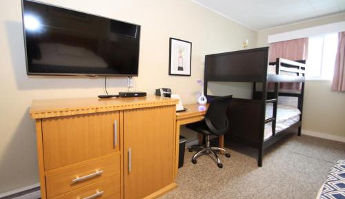 Standard Room with One Queen Bed and Bunk Bed