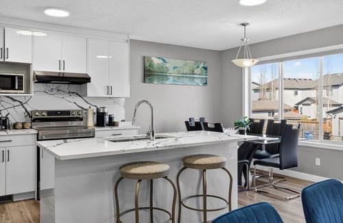Airdrie House | Luxury Urban Oasis in Prime Location