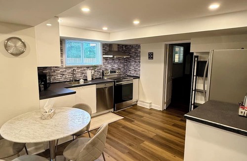 Aurora House | Bright Walk-Out Suite with Private Entrance, Parking & Backyard …