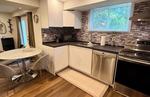 Aurora House | Bright Walk-Out Suite with Private Entrance, Parking & Backyard …