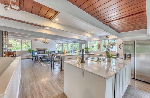 District of North Vancouver House | Modern 4BR Mid-Century Home - Solarium, Deck & Jacuzzi