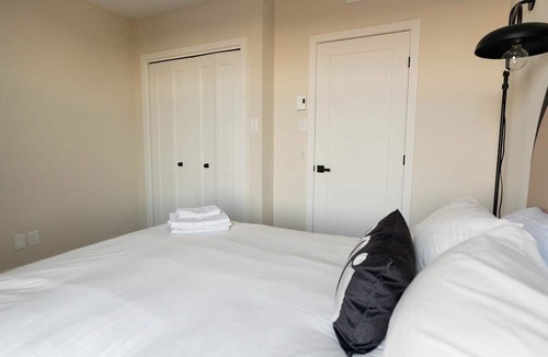 Old Montreal Apartment | Maison Place Royale Luxury Waterfront One-Bedroom Apartment Old Montreal Water View St. Lawrence River Full Kitchen Stone Walls Wi-Fi AC