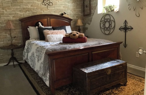 Rosemount Apartment | Large private fenced yard with guest patio, fire pit and surrounding gardens.