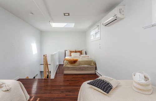 Downtown Montreal Apartment | Bright & Stylish Mezzanine – Live on Bishop St