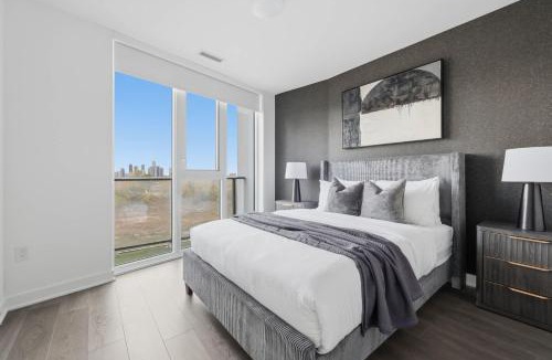 The Queensway Apartment | Modern 3BR Condo Sleeps 8 with Floor-to-Ceiling Views