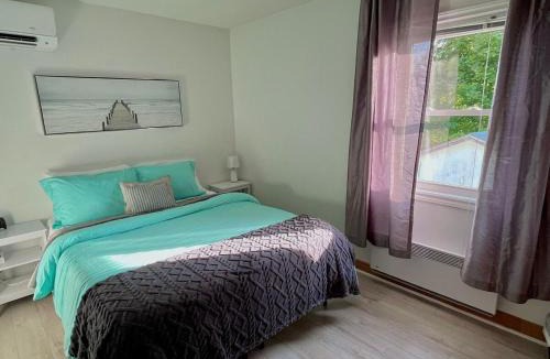 Lewisporte Apartment | SpringHouse Saltwater Vista with Sunroom & Backyard