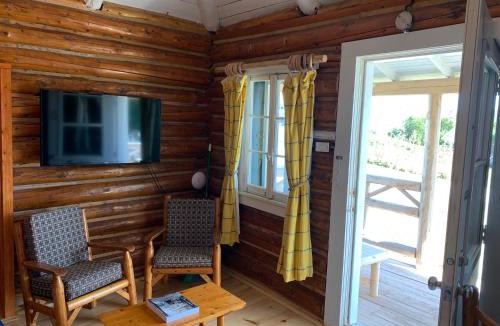 Perce Hotel | Au Pic de l'Aurore Motel-Chalets
