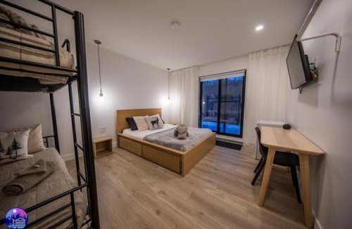 Trois-Rives Apartment | Chalet Flodhaus- Bord Rivière St-Maurice (navigable)/SPA/SAUNA - Chalets Galaxia