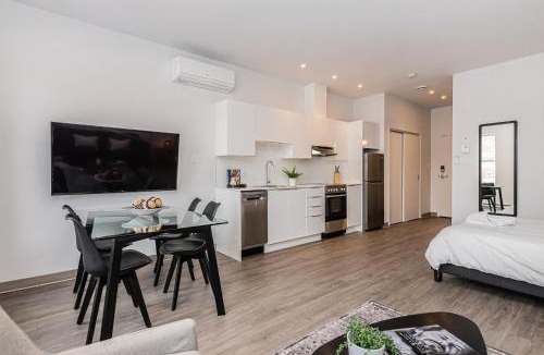 Plateau Mont Royal Apartment | Modern and New Studio in the Heart of the City by Den Stays