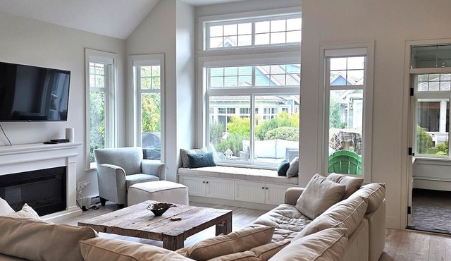Welcome to The Cottages! This stunning 3-bedroom, 3-bathroom cottage offers a beachy vibe