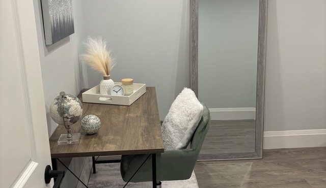 Modern, clean, bright two bedroom lower level look out duplex with large windows