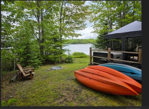Waterfront home on Graham Lake with kayaks, bikes, firepit & fireplace in Mariaville